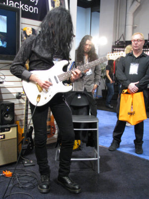 Mike Campese Playing at NAMM 2013 - GJ2 Guitar Booth. Oz Fox watching.