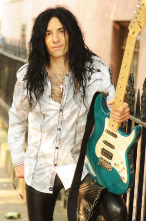 Mike Campese Outside Promo Shot. Blue Guitar.
