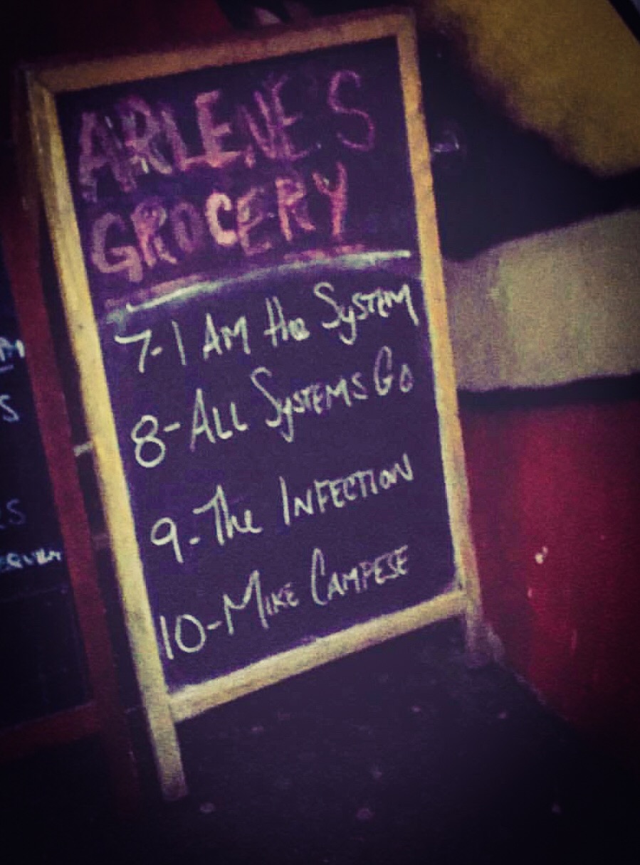 Mike Campese Live in NYC, Arlene's Grocery sign.